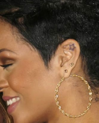 Rihanna Left Ear Star Tattoo