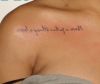Rihanna "Never a failure, always a lesson" motto in mirror writing chest tattoo