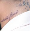 Rihanna rebelle fleu side neck tattoo