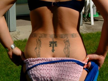 Feather Tattoo On Back