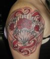 asina fan tattoo on shoulder