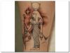 egyptian tattoo on leg