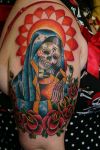 egyptian tats on girl shoulder