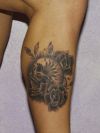 mexican skull and flower tattoo