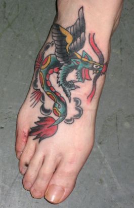 Colorful Dragon Pic Tattoo On Feet