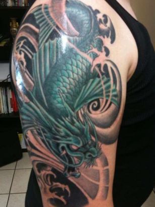 Dragon Pic Tattoo On Half Sleeve