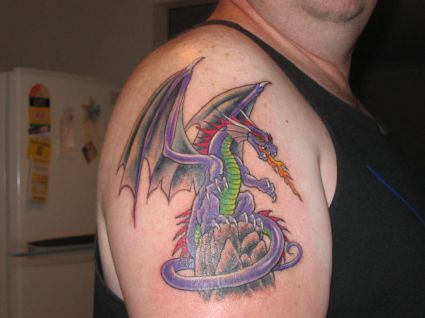 Dragon Pic Tattoo On Right Arm