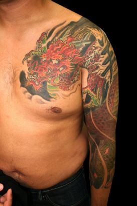 Dragon Pic Tattoo Sleeve And Chest