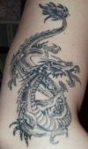 dragon pic arm tattoo