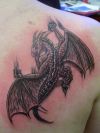 dragon pic tattoo on right shoulder blade