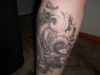 dragon pics tattoos on leg
