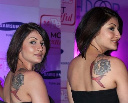 Urvashi Dholakhiya Back Dolphin Tattoo