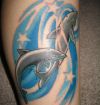 leg dolphin tattoos