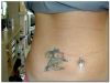 dolphin girl's stomach tattoo 