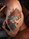 Koi fish tattoo on shoulder