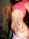 mermaid and her child tattoo 