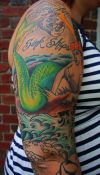 mermaid arm tattoo