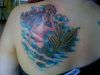 mermaid girl's back tattoo