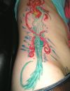 mermaid tattoo on side stomach