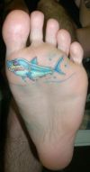 shark tats on paw