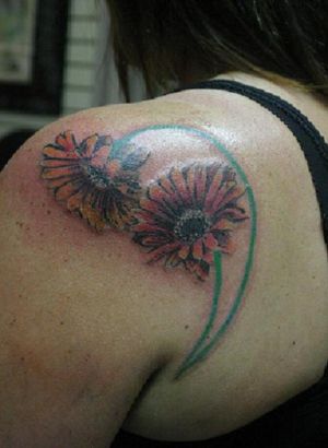 Flower Tattoo On Shoulder Of Girl