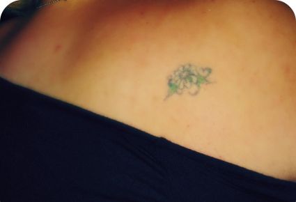 Daisy Shoulder Tattoo