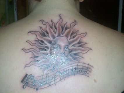 Daisy Flower Tattoo On Back