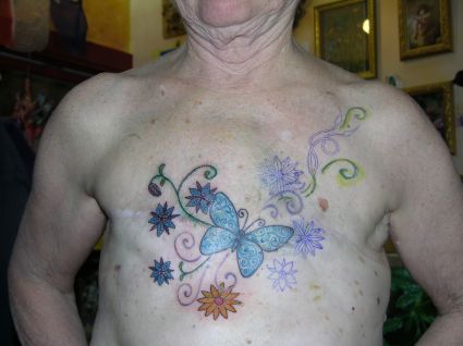 Man With Daisy Flower Tat