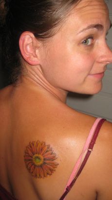 Daisy Flower On Girl's Back