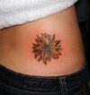 daisy side back tattoo