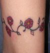 daisy vine tattoo