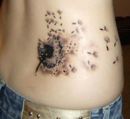 Dandelion Blowing Flower Tattoo On Back