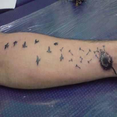 Dandelion Flower Blowing And Flying Birds Tattoo On Arm
