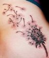 dandelion flower blowing tattoo