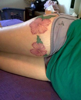 Hibiscus Flower Tattoo On Thigh