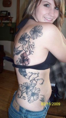 Hibiscus Tats On Side Back