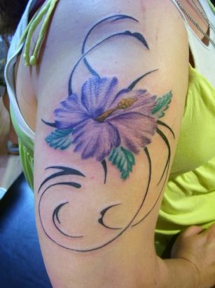 Hibiscus Girl's Arm Tattoo