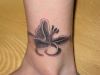 Black lily tattoo design