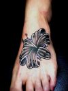 Black lily tattoo image