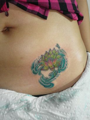 Lotus Tats On Lower Stomach