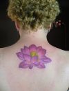 Lotus tattoo on girls back
