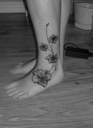 Flower Tattoo On Ankle