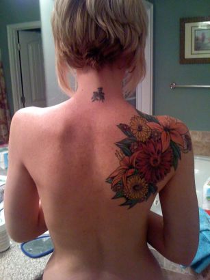 Flower Tattoo On Left Shoulder Blade