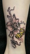 flower with bee tattoo