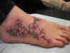flower tattoo on feet