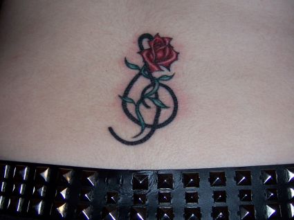 Small Rose Lower Back Tattoo