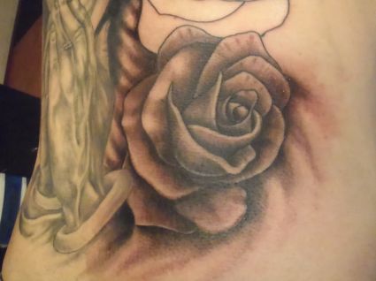 Rose Tat