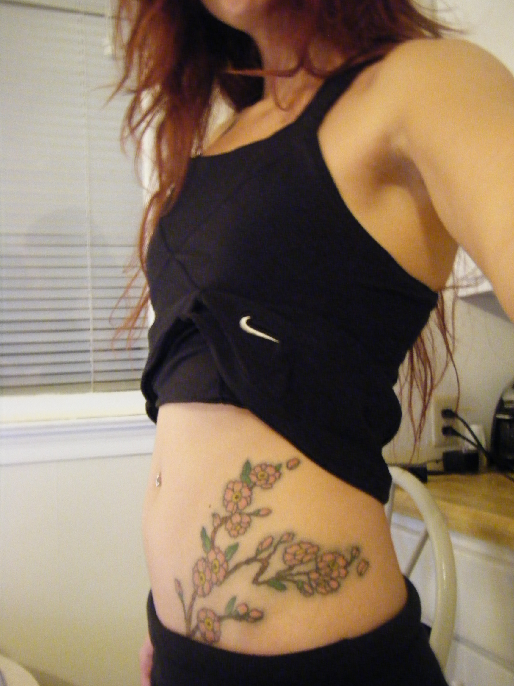 Cherry Blossom Tattoos on the Stomach