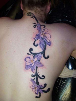 Lilly Tattoo On Back Shoulder Of Girl