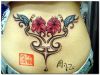 girl lower back tattoo